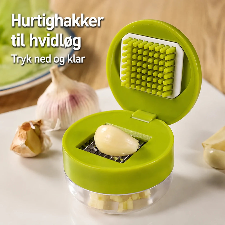 Manuel hvidløgspresser med opsamlingsbeholder